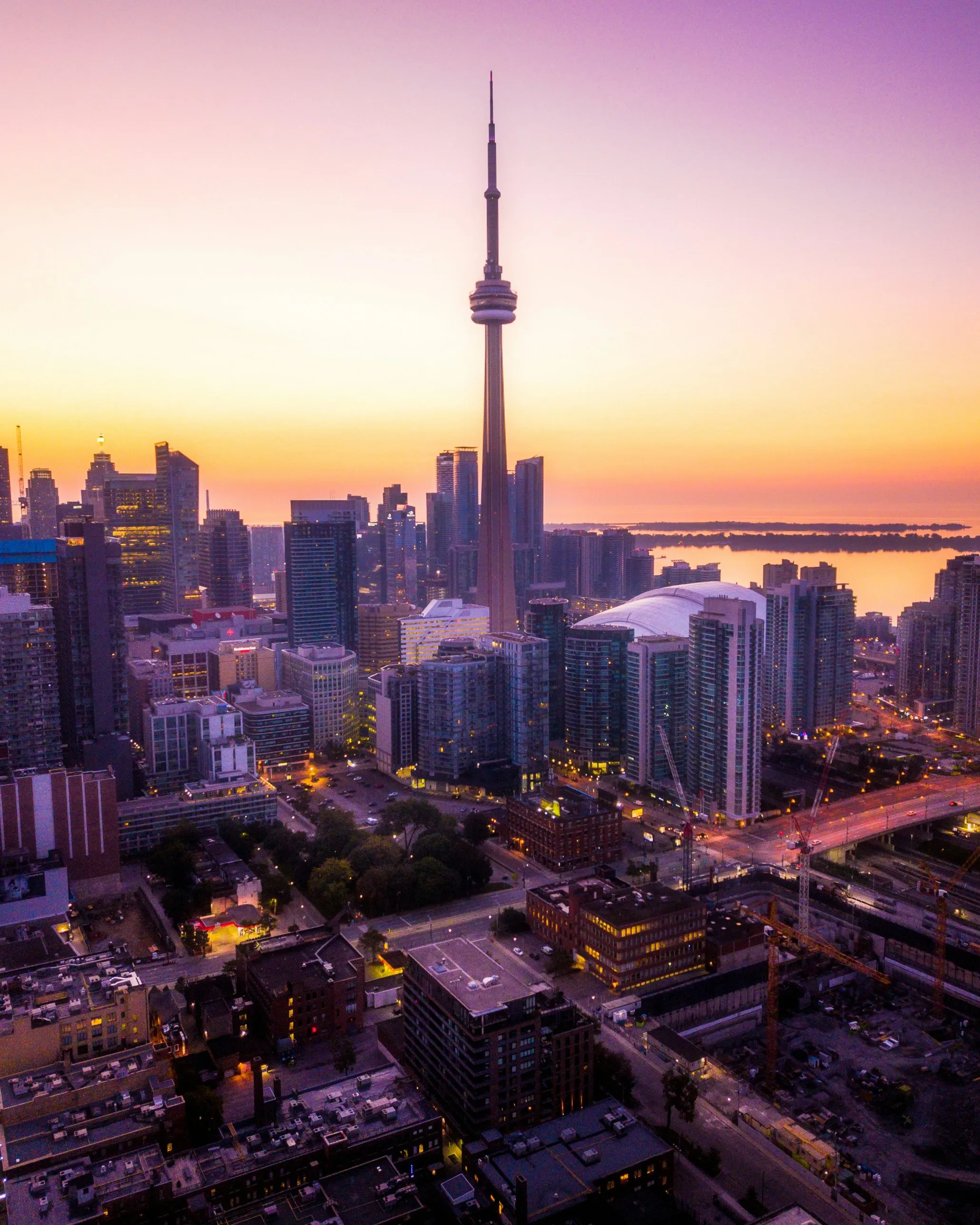 Aerial view of downtown Toronto and the CN Tower at dawn